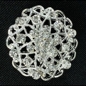Costume Jewelry Brooch from Estate Sale. Silver colored with rhinestones.